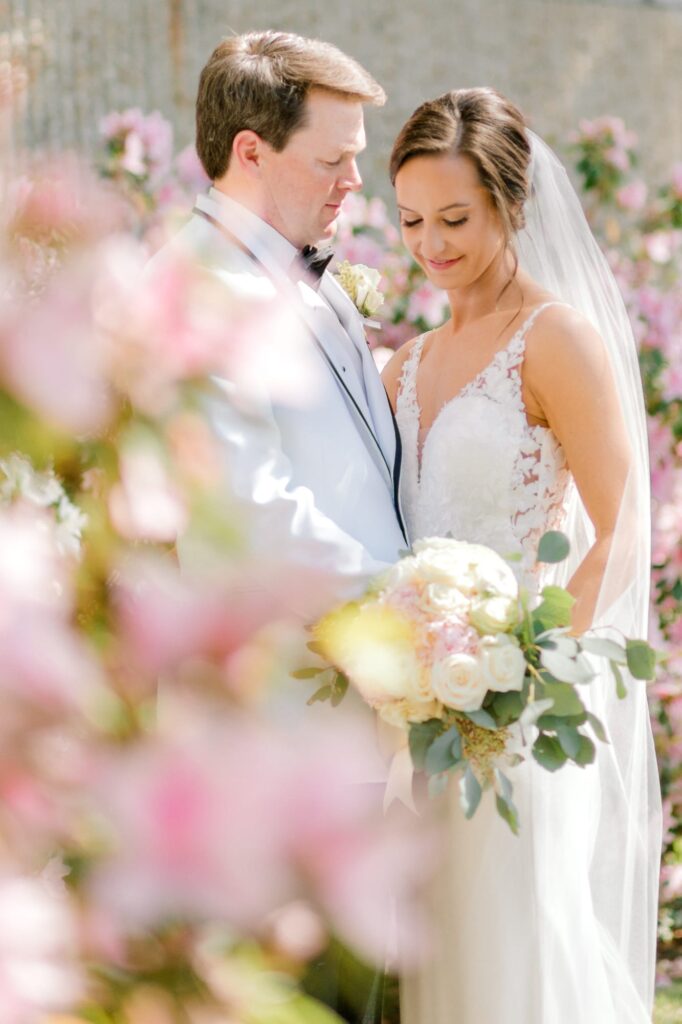 Bride and groom in flowers