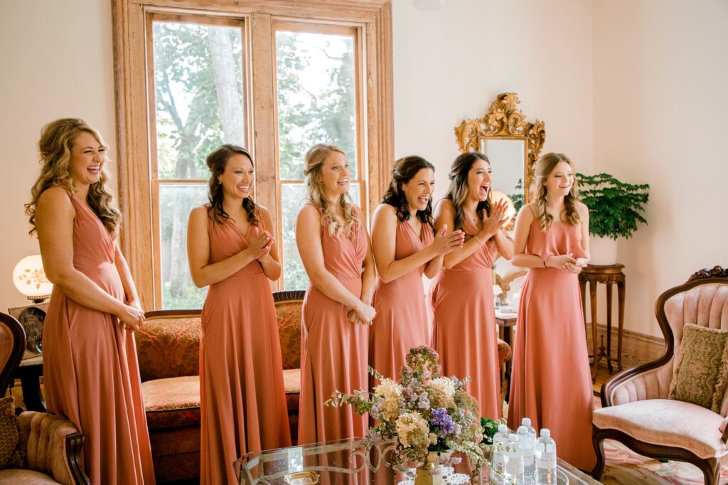 Bridesmaid in coral at Simmons House