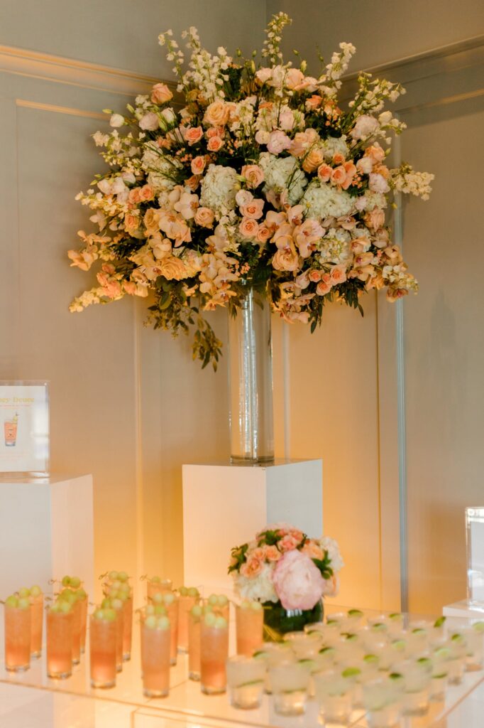 Tall centerpiece and cocktails at The Lyric wedding
