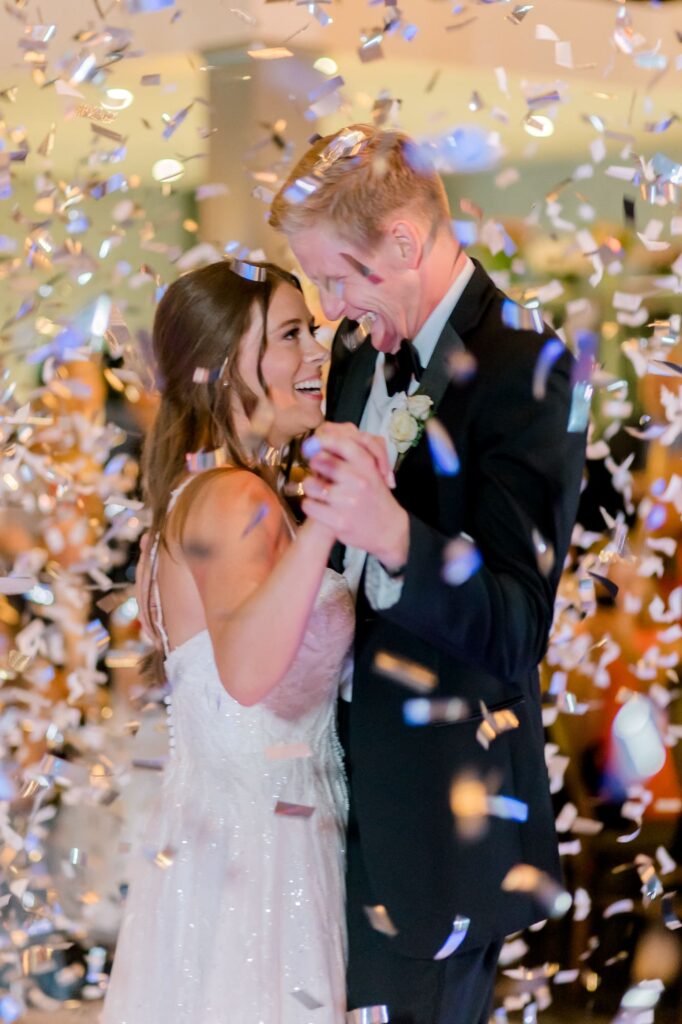 Bride and groom dance under confetti at The Lyric Oxford
